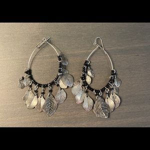 Silver and black dangle earrings.